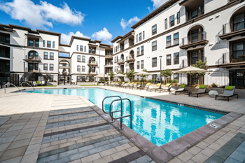 Heated resort style pool & spa with poolside cabanas